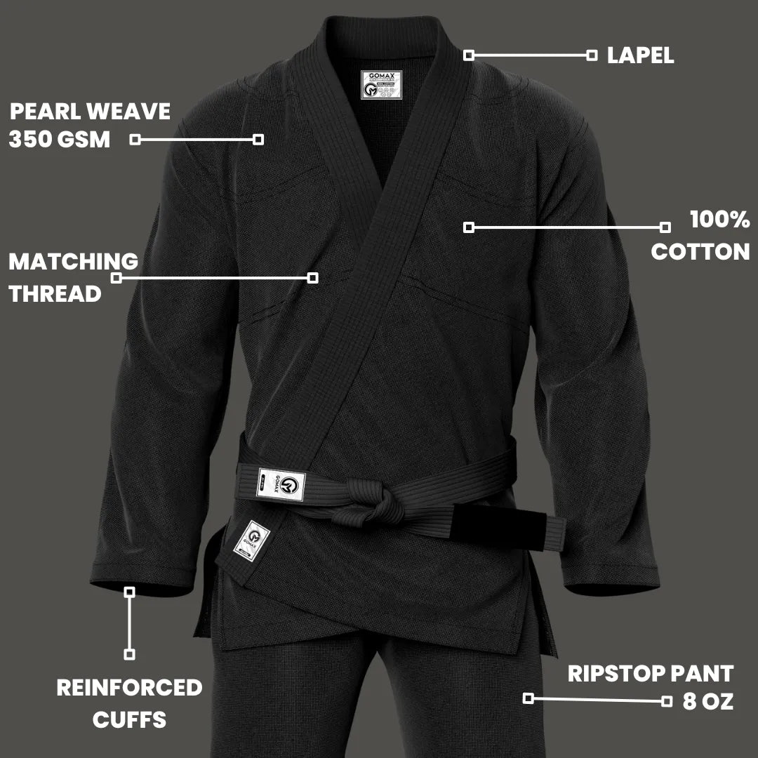 Black gi for trial classes shown in academy setting with clean branding and tapered fit