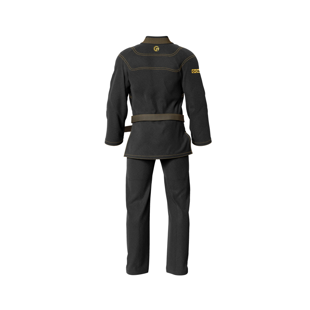Elite black grappling gi laid flat with contrast stitching and IBJJF patch