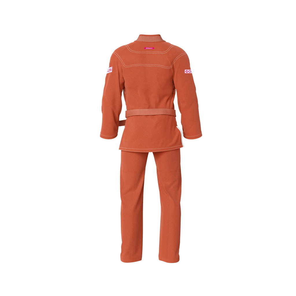 Tournament orange gi back profile with durable seams for match‑ready performance