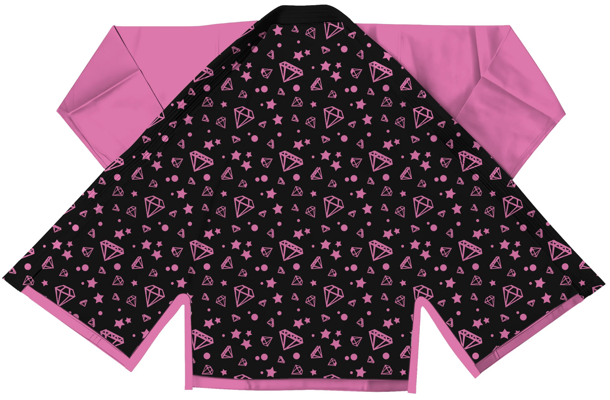 Fashion pink gi displayed with pearl weave jacket and contrast stitching