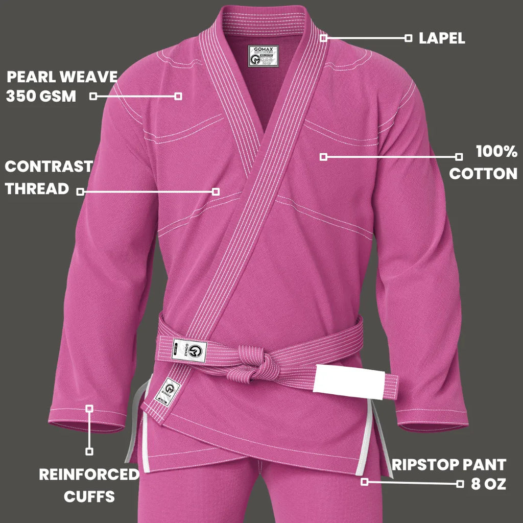 Pink gi for kids shown in academy setting with white belt and clean branding