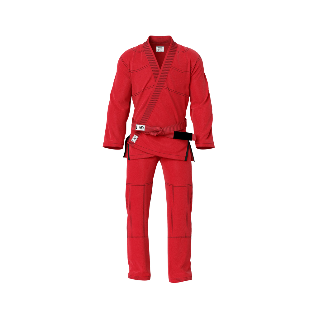Red BJJ gi worn by male athlete during sparring session in academy setting